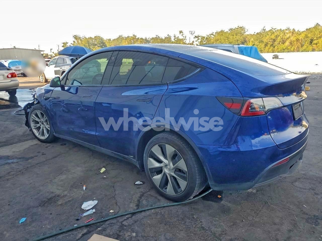 Photo 2 of 2023 TESLA MODEL Y (VIN 7SAYGAEE7PF759476)