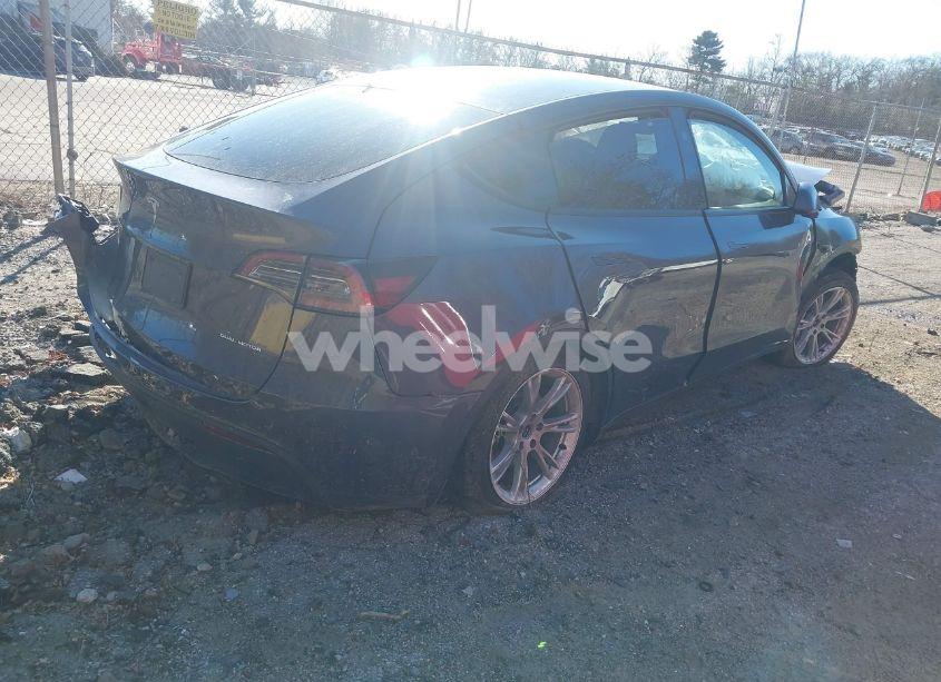 Photo 4 of 2023 Tesla Model Y AWD/LONG RANGE DUAL MOTOR ALL-WHEEL DRIVE (VIN 7SAYGAEE7PF926872)