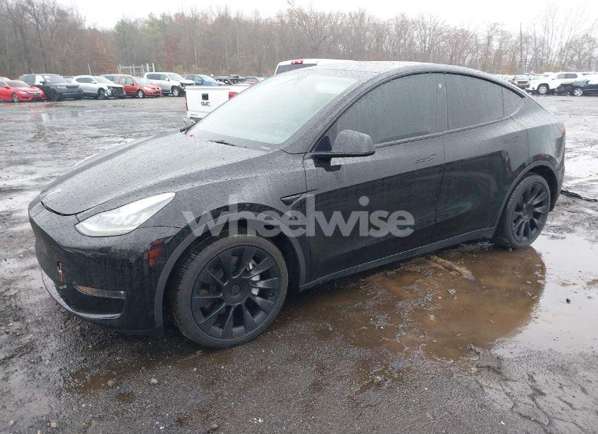 Photo 2 of 2023 Tesla Model Y AWD/LONG RANGE DUAL MOTOR ALL-WHEEL DRIVE (VIN 7SAYGAEE8PF610509)