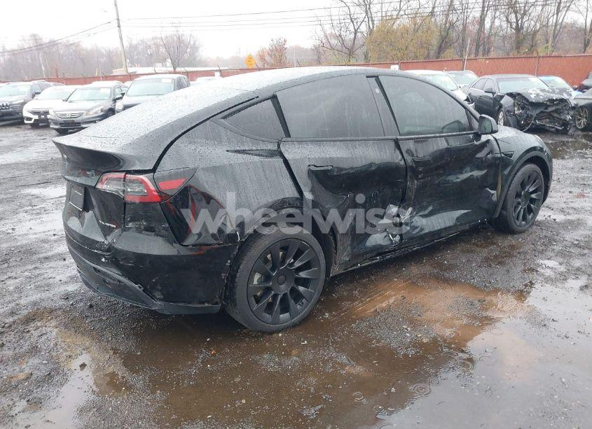 Photo 4 of 2023 Tesla Model Y AWD/LONG RANGE DUAL MOTOR ALL-WHEEL DRIVE (VIN 7SAYGAEE8PF610509)