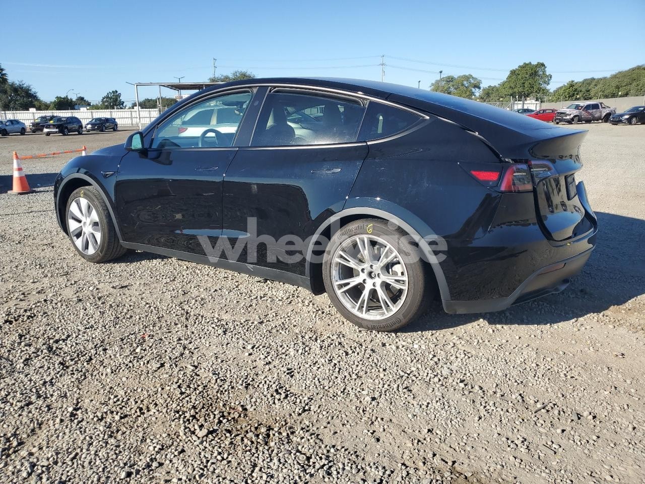 Photo 2 of 2023 TESLA MODEL Y (VIN 7SAYGAEE8PF873194)