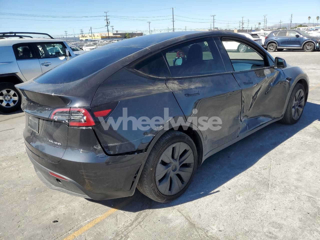 Photo 3 of 2024 TESLA MODEL Y (VIN 7SAYGAEE8RF209495)