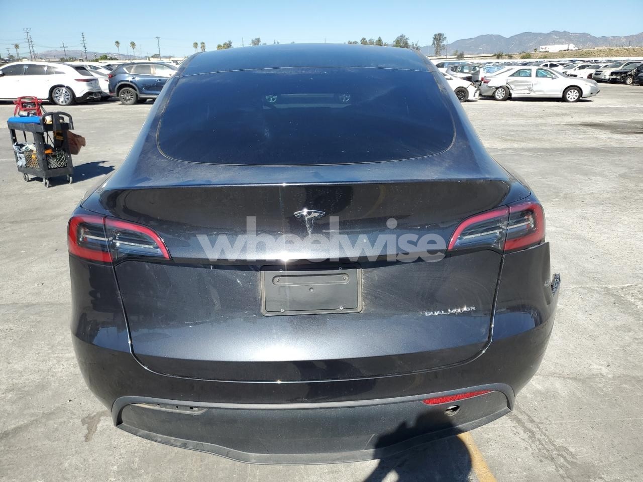 Photo 6 of 2024 TESLA MODEL Y (VIN 7SAYGAEE8RF209495)