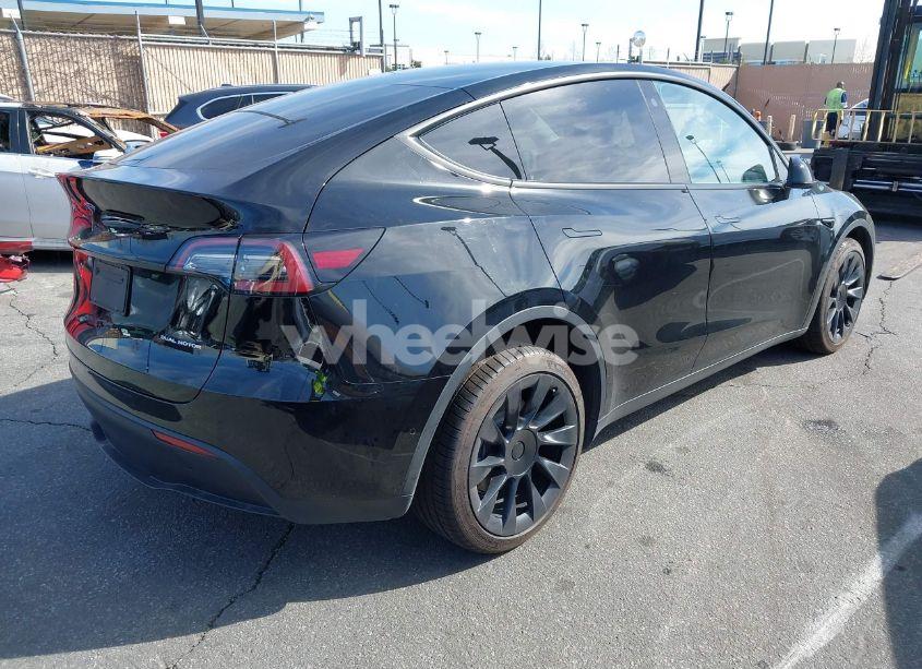 Photo 4 of 2022 Tesla Model Y LONG RANGE DUAL MOTOR ALL-WHEEL DRIVE (VIN 7SAYGAEE9NF541939)