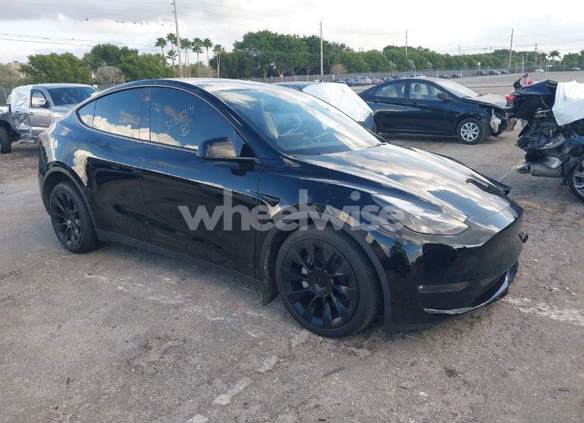 2023 Tesla Model Y AWD/LONG RANGE DUAL MOTOR ALL-WHEEL DRIVE (VIN 7SAYGAEE9PF708061) main photo