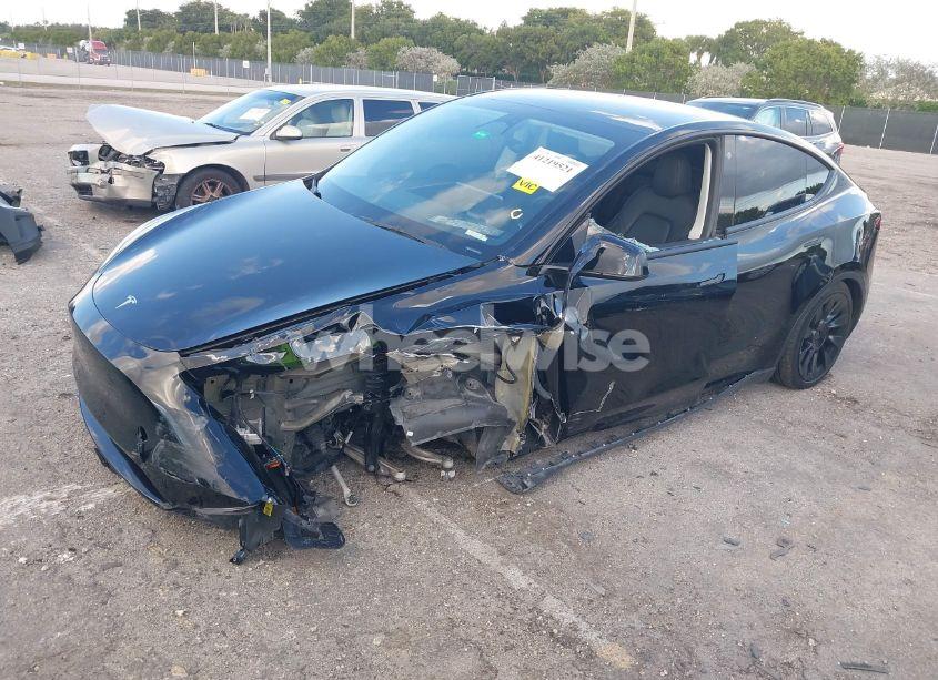 Photo 2 of 2023 Tesla Model Y AWD/LONG RANGE DUAL MOTOR ALL-WHEEL DRIVE (VIN 7SAYGAEE9PF708061)