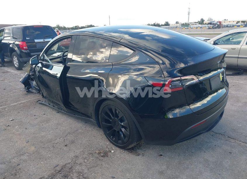 Photo 3 of 2023 Tesla Model Y AWD/LONG RANGE DUAL MOTOR ALL-WHEEL DRIVE (VIN 7SAYGAEE9PF708061)