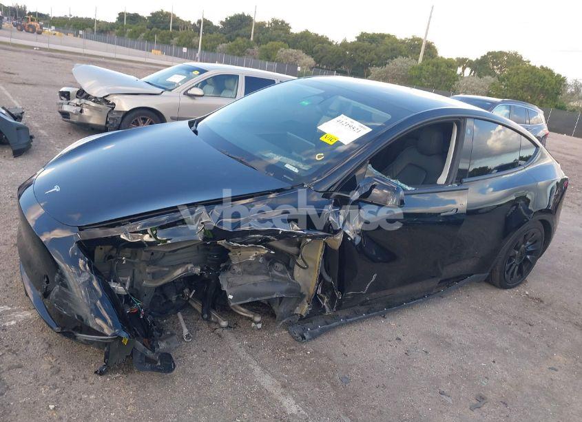 Photo 6 of 2023 Tesla Model Y AWD/LONG RANGE DUAL MOTOR ALL-WHEEL DRIVE (VIN 7SAYGAEE9PF708061)