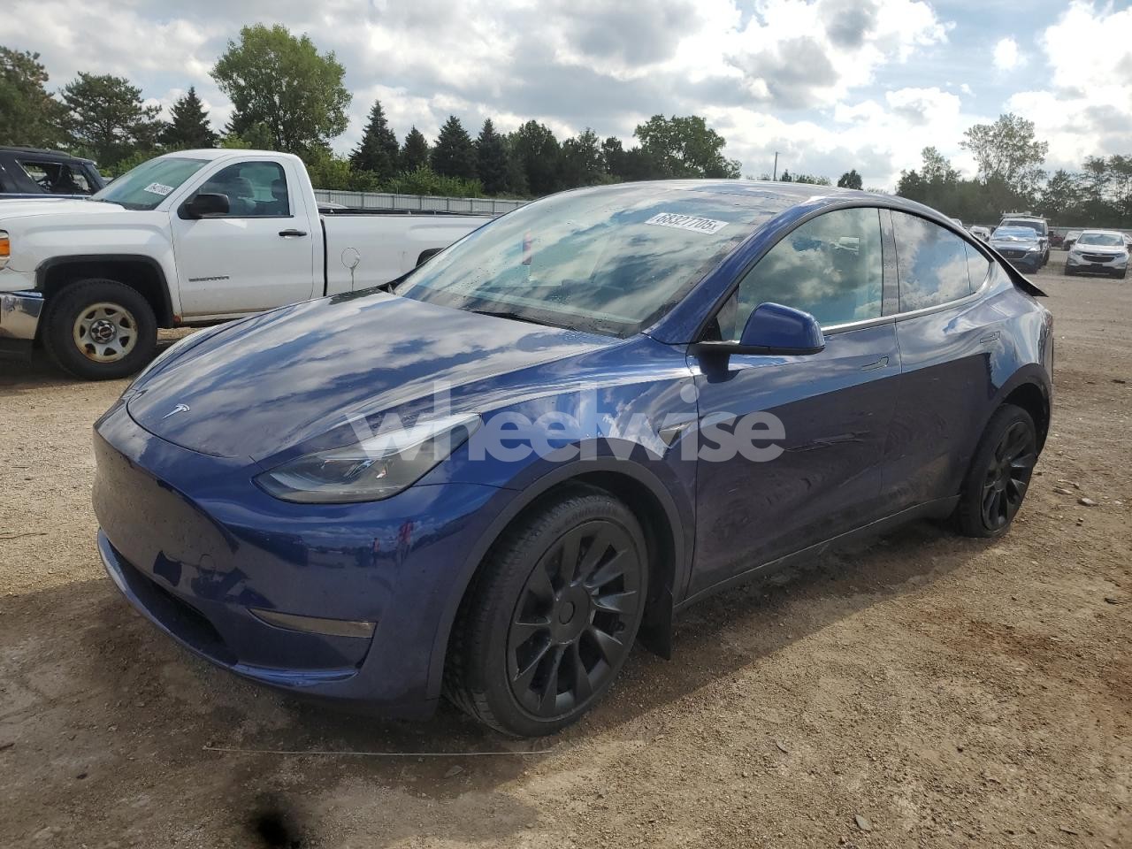 2023 TESLA MODEL Y (VIN 7SAYGAEE9PF764730) main photo