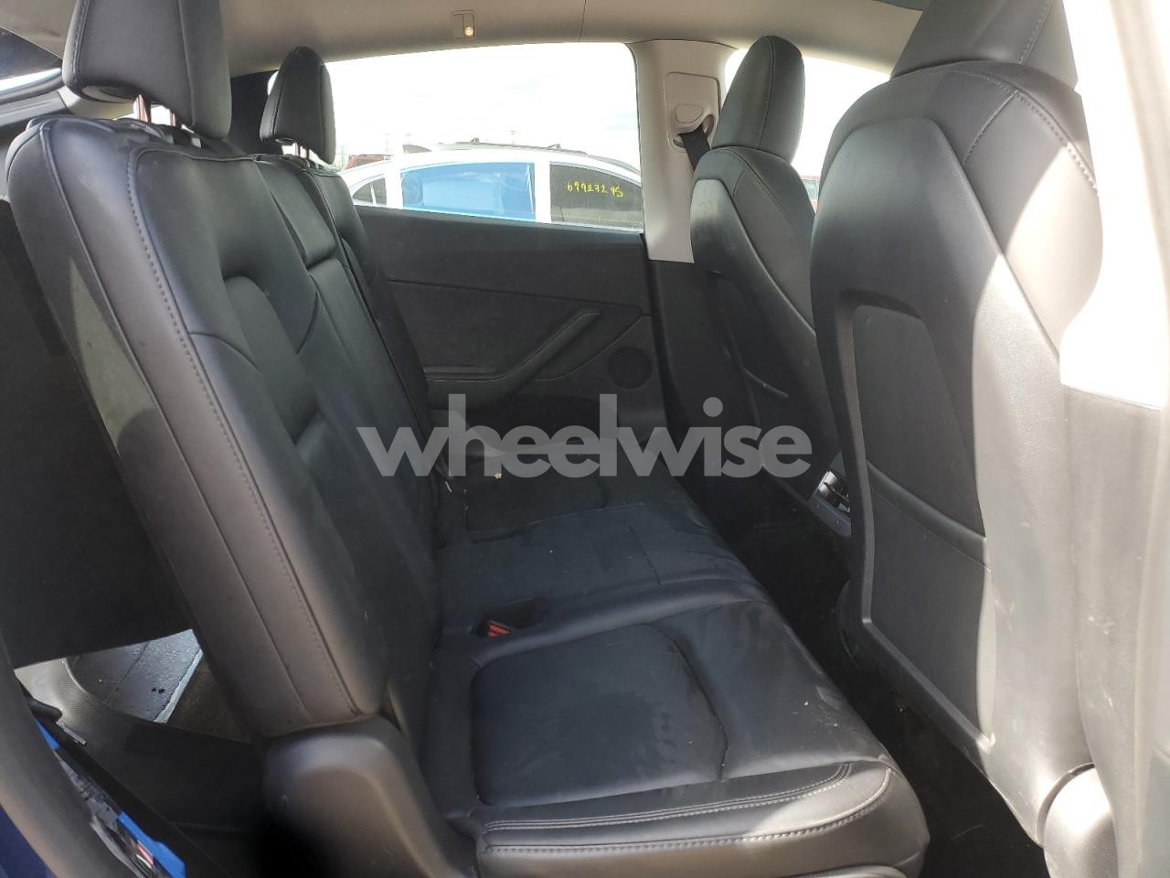 Photo 10 of 2023 TESLA MODEL Y (VIN 7SAYGAEE9PF764730)