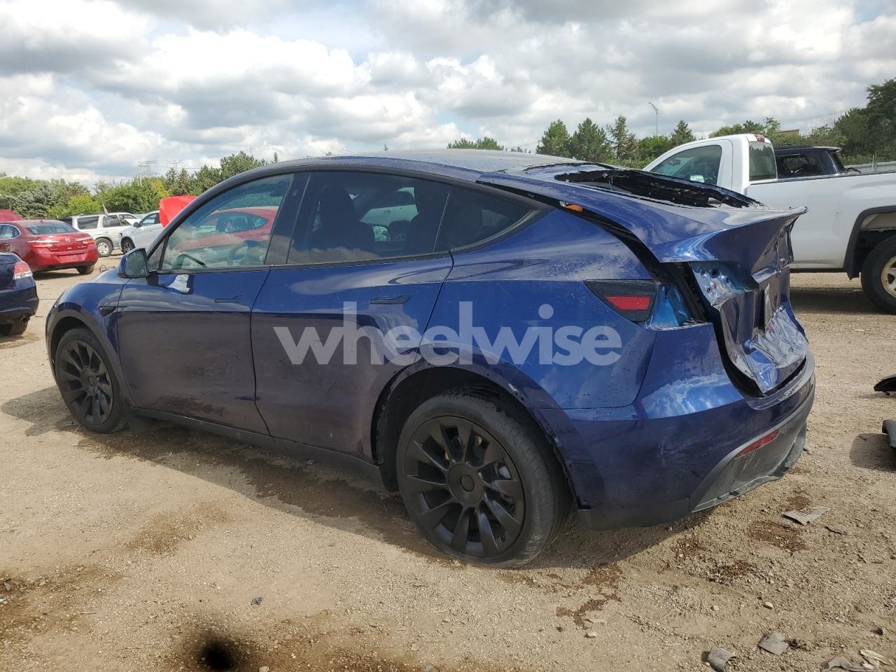 Photo 2 of 2023 TESLA MODEL Y (VIN 7SAYGAEE9PF764730)