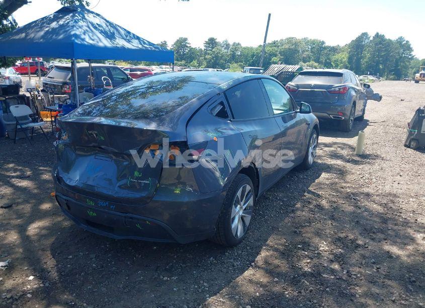 Photo 4 of 2023 Tesla Model Y AWD/LONG RANGE DUAL MOTOR ALL-WHEEL DRIVE (VIN 7SAYGAEE9PF916988)