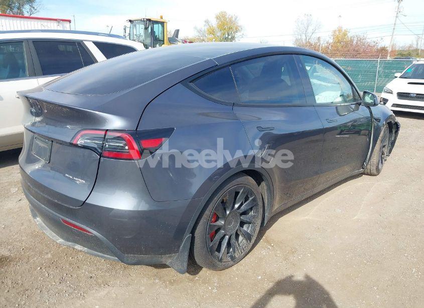Photo 4 of 2023 Tesla Model Y AWD/LONG RANGE DUAL MOTOR ALL-WHEEL DRIVE (VIN 7SAYGAEEXPF695613)