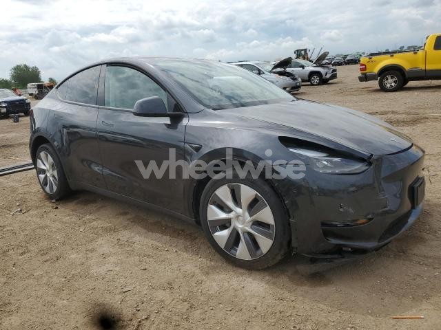 Photo 2 of 2024 TESLA MODEL Y (VIN 7SAYGAEEXRF072902)