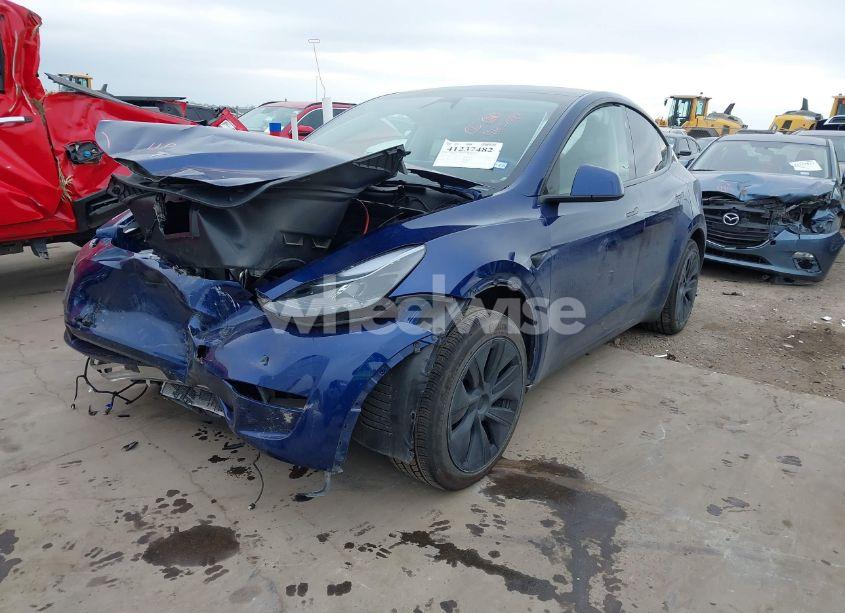 Photo 2 of 2024 Tesla Model Y (VIN 7SAYGDED1RA308245)