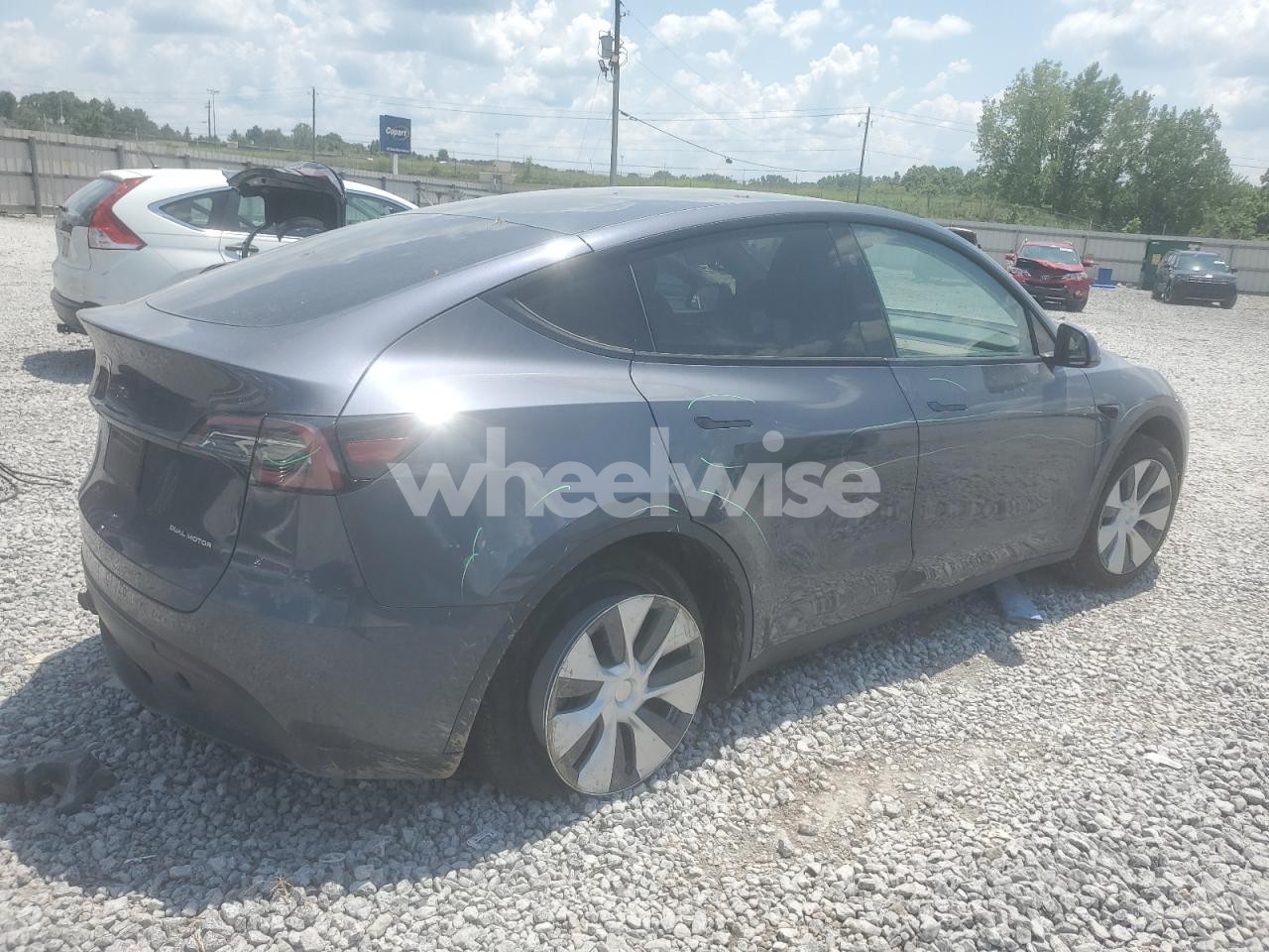 Photo 3 of 2023 TESLA MODEL Y (VIN 7SAYGDED2PF942213)
