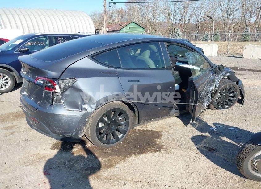 Photo 4 of 2023 Tesla Model Y RWD (VIN 7SAYGDED3PF958047)