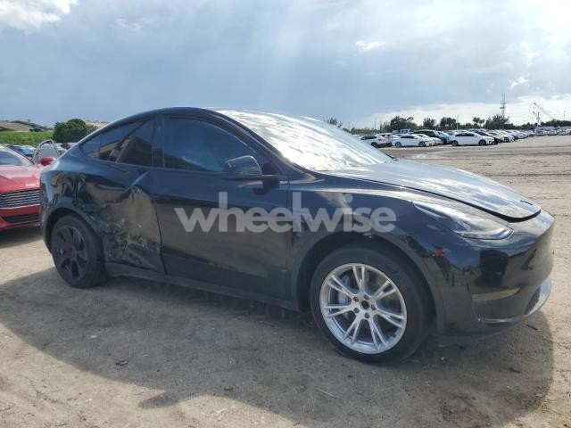 Photo 2 of 2024 TESLA MODEL Y (VIN 7SAYGDED4RF015491)