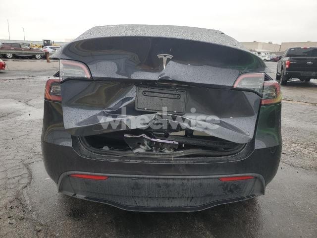 Photo 2 of 2024 TESLA MODEL Y (VIN 7SAYGDED4RF125330)