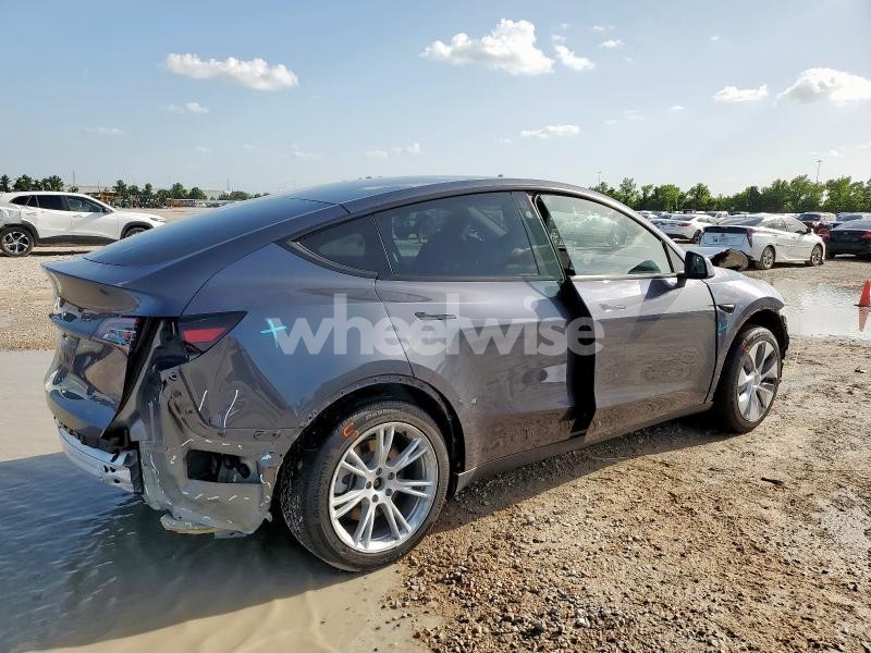 Photo 6 of 2023 TESLA MODEL Y (VIN 7SAYGDED6PF943171)