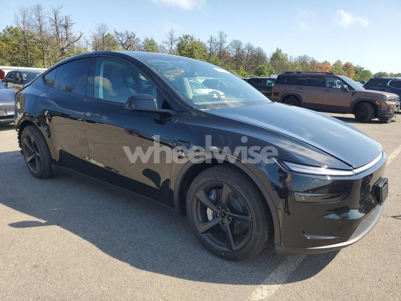 Photo 4 of 2026 TESLA MODEL Y (VIN 7SAYGDED8TF383535)