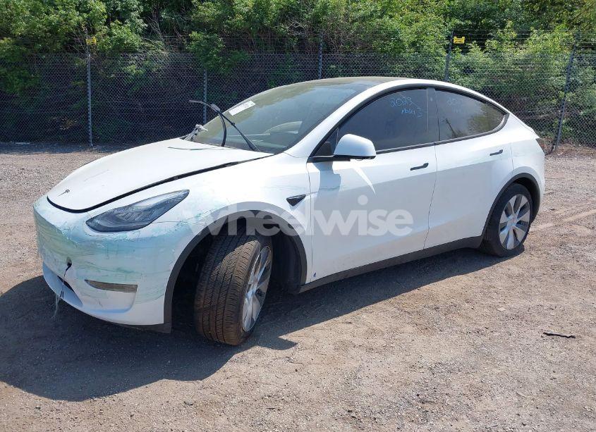 Photo 2 of 2023 Tesla Model Y AWD/LONG RANGE DUAL MOTOR ALL-WHEEL DRIVE (VIN 7SAYGDEE0PA130057)