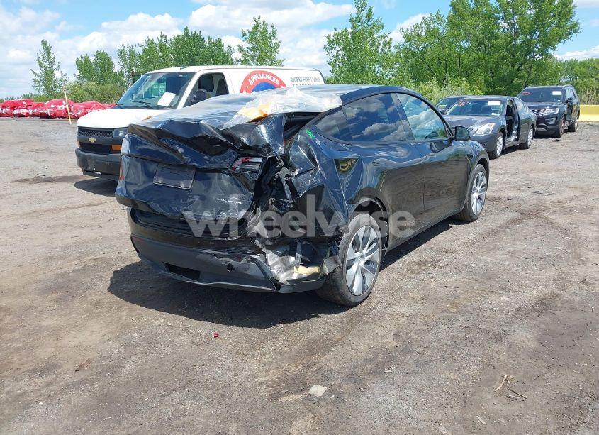 Photo 4 of 2023 Tesla Model Y AWD/LONG RANGE DUAL MOTOR ALL-WHEEL DRIVE (VIN 7SAYGDEE0PA183891)