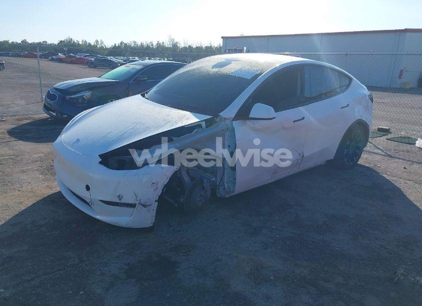 Photo 2 of 2023 Tesla Model Y AWD/LONG RANGE DUAL MOTOR ALL-WHEEL DRIVE (VIN 7SAYGDEE0PA199427)