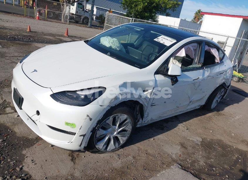 Photo 2 of 2023 Tesla Model Y AWD/LONG RANGE DUAL MOTOR ALL-WHEEL DRIVE (VIN 7SAYGDEE0PF746909)