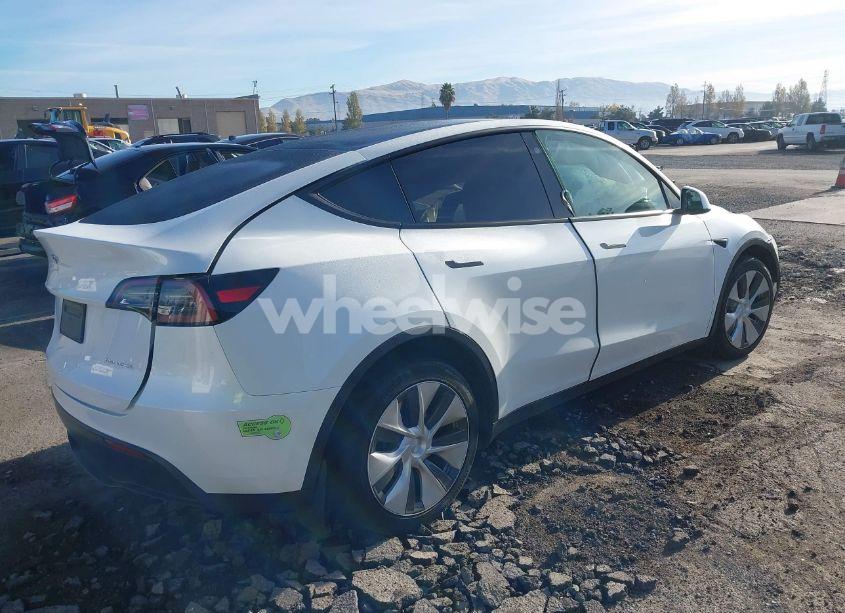 Photo 4 of 2023 Tesla Model Y AWD/LONG RANGE DUAL MOTOR ALL-WHEEL DRIVE (VIN 7SAYGDEE0PF746909)