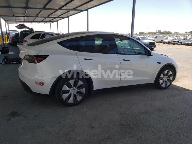 Photo 6 of 2023 TESLA MODEL Y (VIN 7SAYGDEE0PF812021)