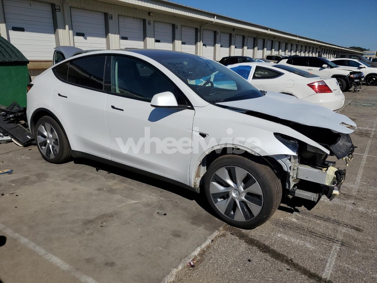 Photo 4 of 2023 TESLA MODEL Y (VIN 7SAYGDEE0PF834732)