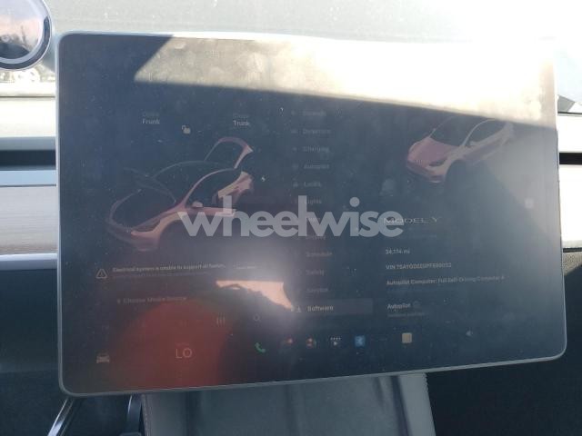 Photo 4 of 2023 TESLA MODEL Y (VIN 7SAYGDEE0PF899032)