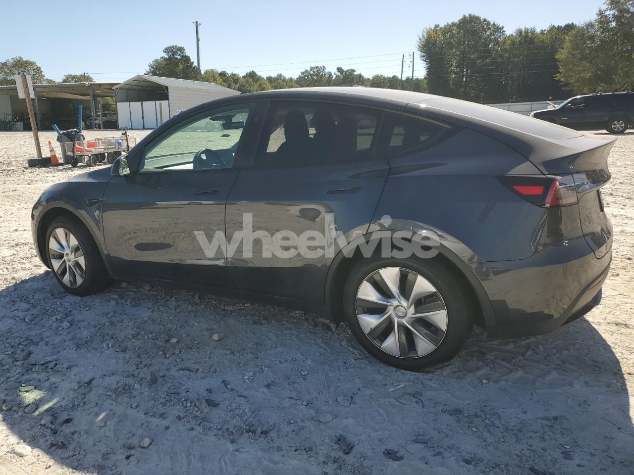 Photo 2 of 2024 TESLA MODEL Y (VIN 7SAYGDEE0RA270466)