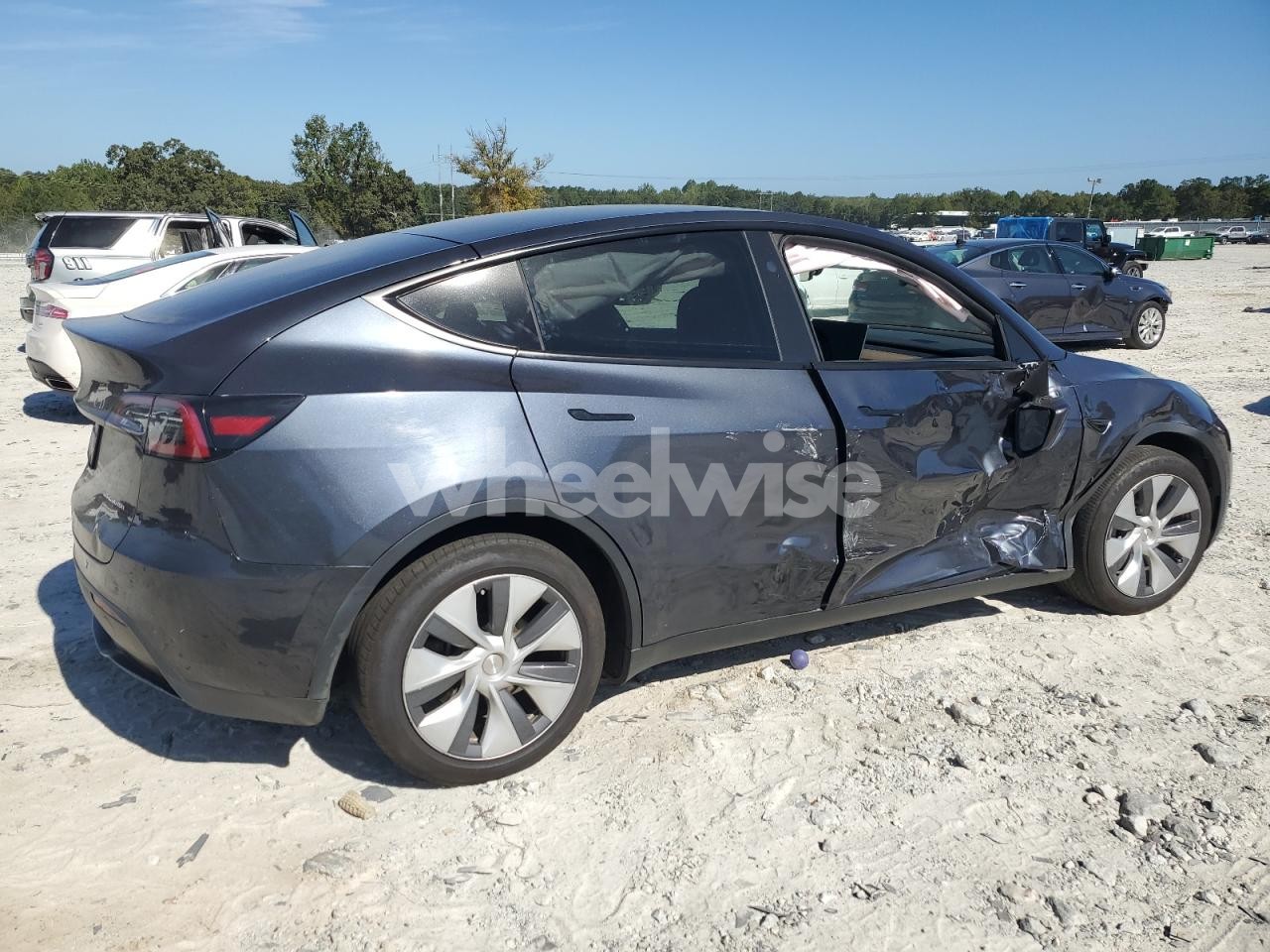 Photo 3 of 2024 TESLA MODEL Y (VIN 7SAYGDEE0RA270466)