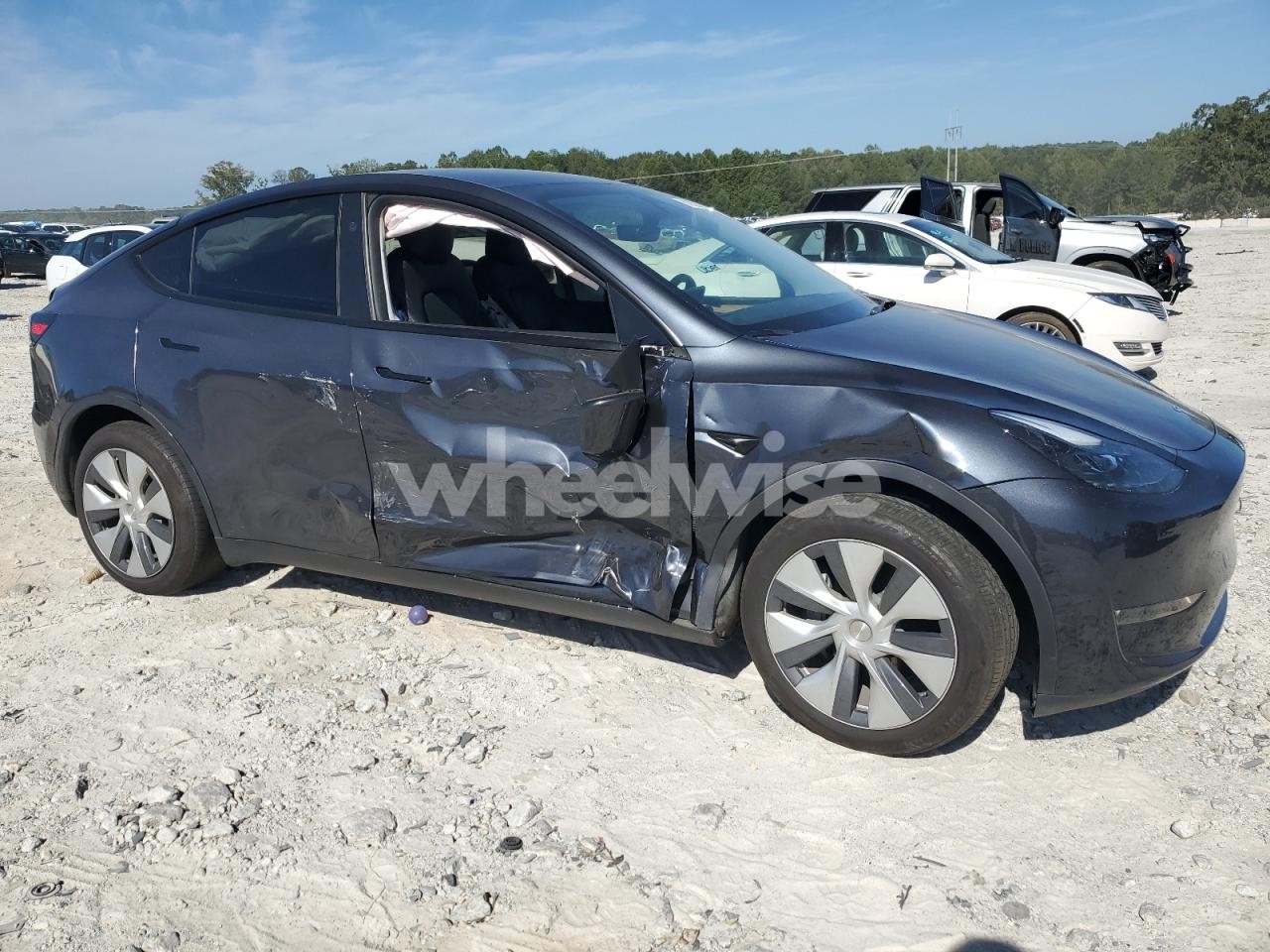 Photo 4 of 2024 TESLA MODEL Y (VIN 7SAYGDEE0RA270466)