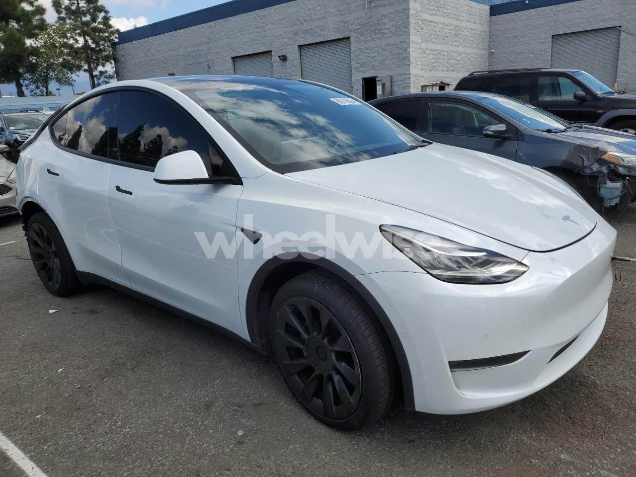 Photo 4 of 2022 TESLA MODEL Y (VIN 7SAYGDEE1NA020440)