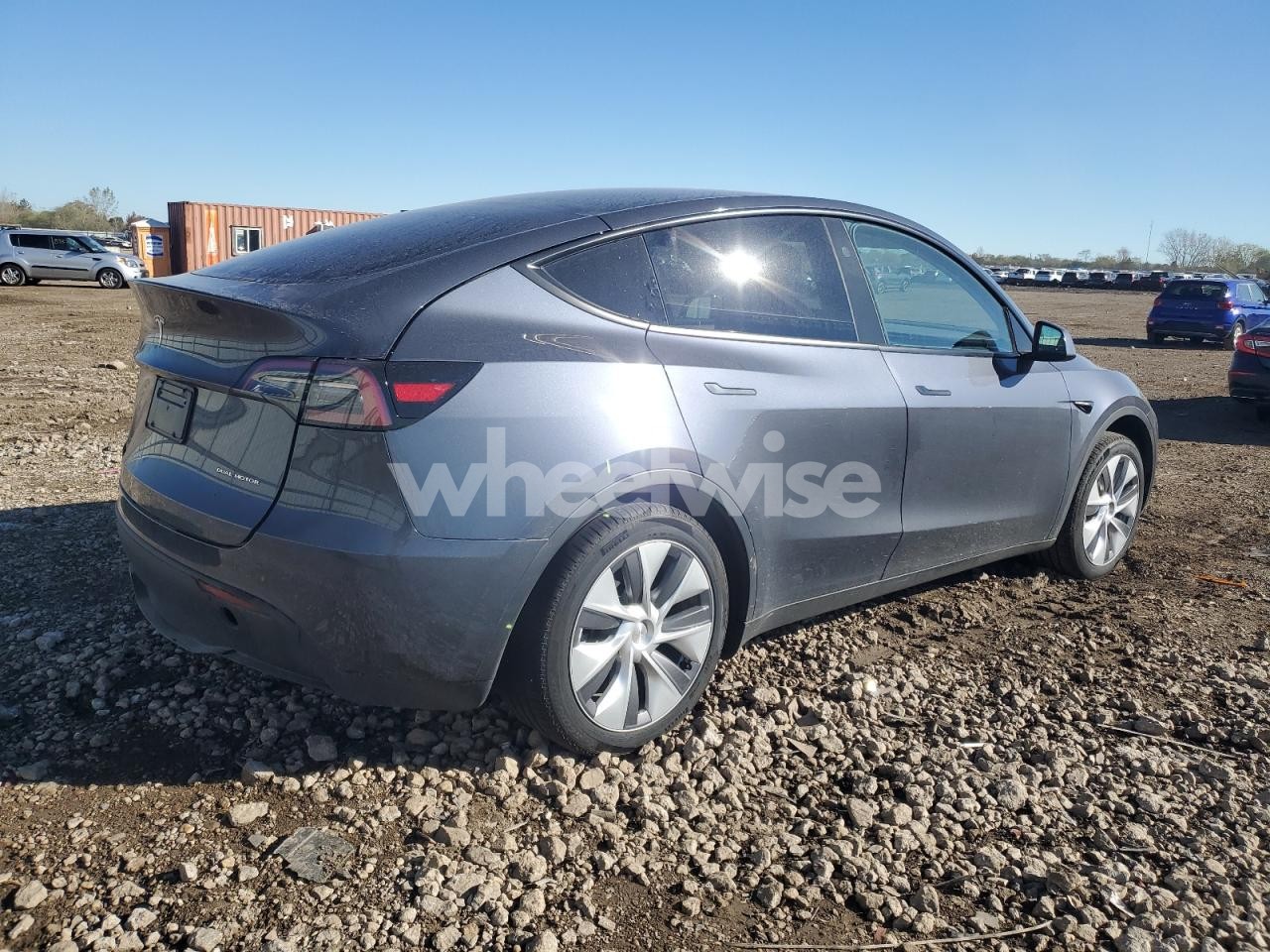 Photo 3 of 2023 TESLA MODEL Y (VIN 7SAYGDEE1PA155517)