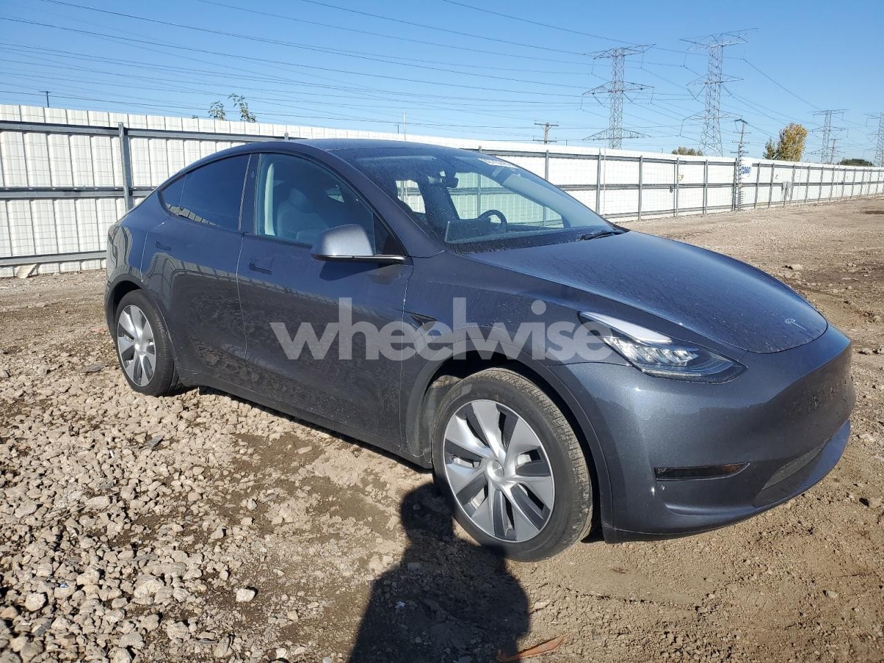 Photo 4 of 2023 TESLA MODEL Y (VIN 7SAYGDEE1PA155517)