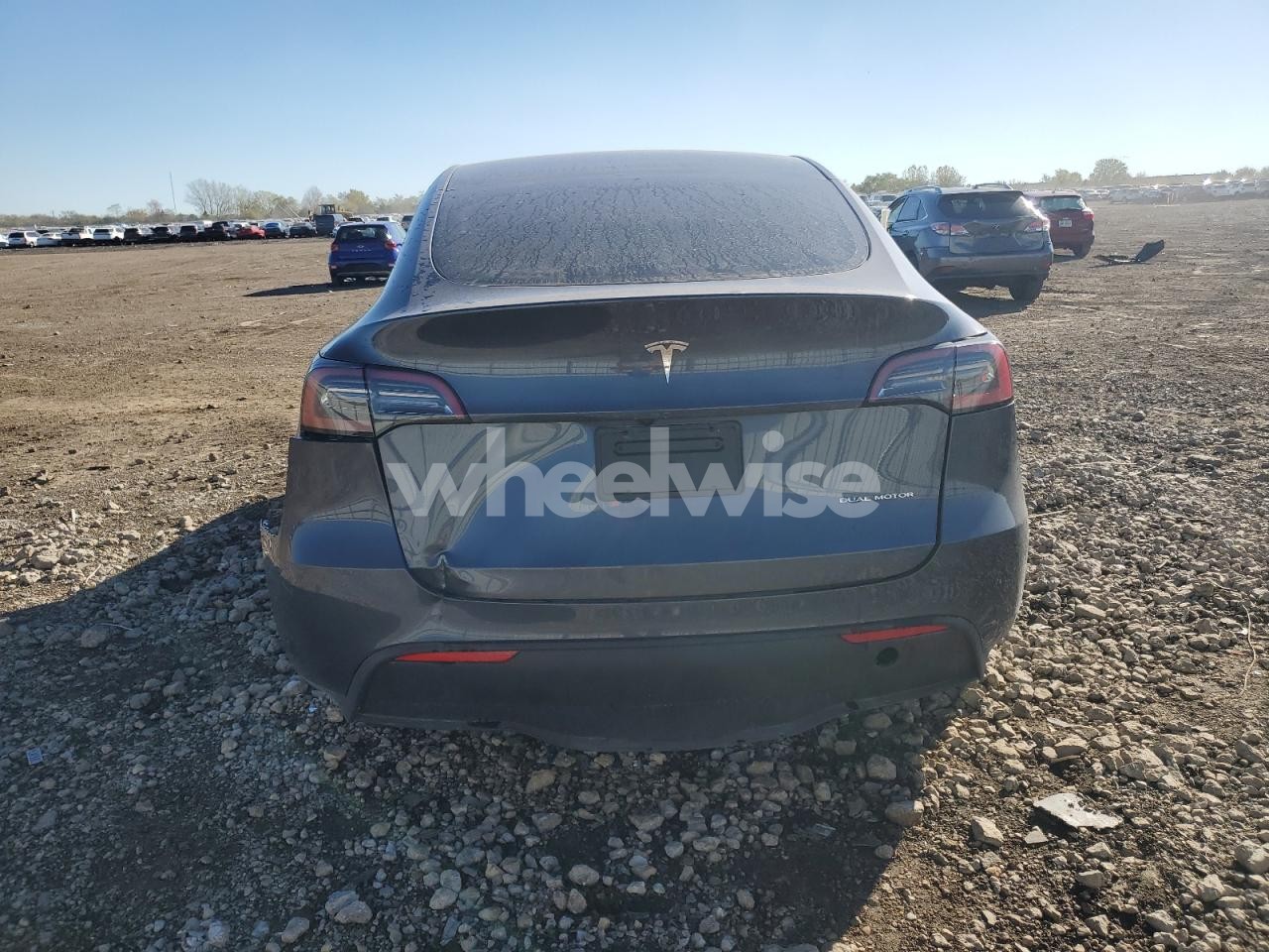Photo 6 of 2023 TESLA MODEL Y (VIN 7SAYGDEE1PA155517)