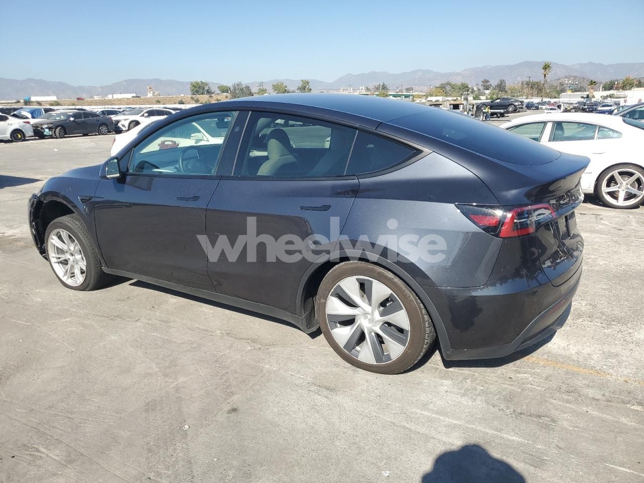 Photo 2 of 2024 TESLA MODEL Y (VIN 7SAYGDEE1RF062096)