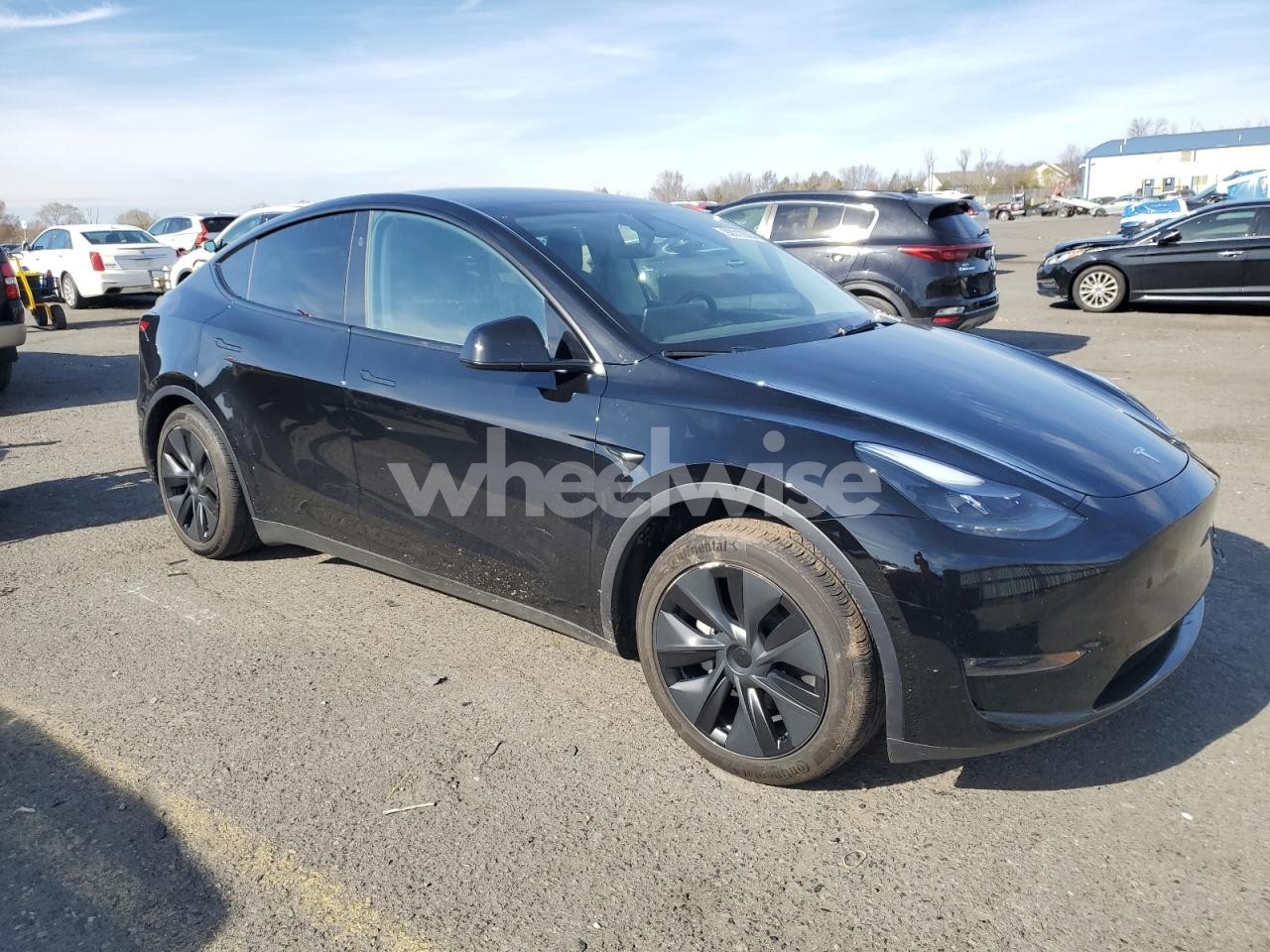 Photo 4 of 2025 TESLA MODEL Y (VIN 7SAYGDEE1SA363065)