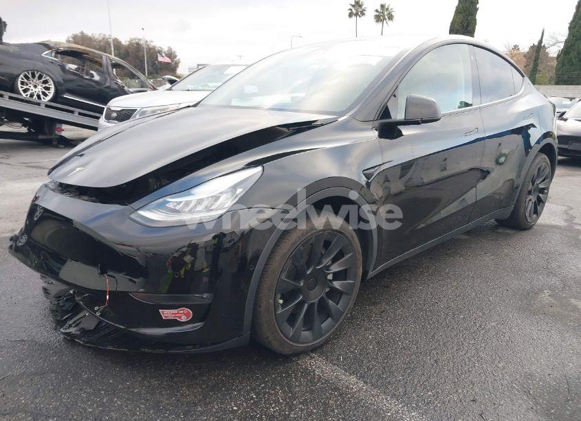 Photo 2 of 2023 Tesla Model Y AWD/LONG RANGE DUAL MOTOR ALL-WHEEL DRIVE (VIN 7SAYGDEE2PA024032)