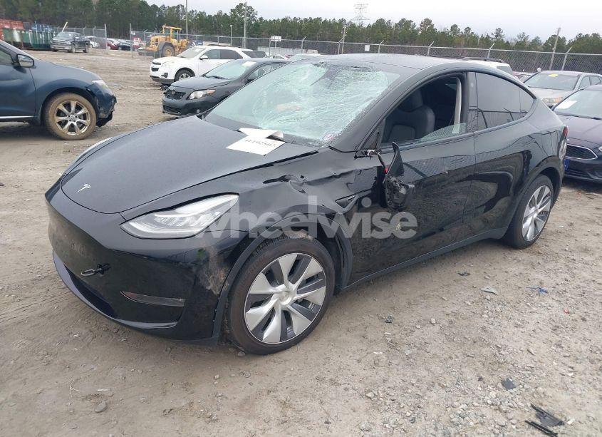 Photo 2 of 2023 Tesla Model Y AWD/LONG RANGE DUAL MOTOR ALL-WHEEL DRIVE (VIN 7SAYGDEE2PA029778)