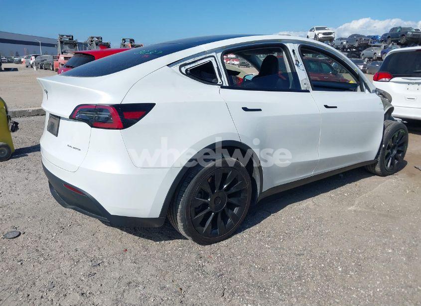 Photo 4 of 2023 Tesla Model Y AWD/LONG RANGE DUAL MOTOR ALL-WHEEL DRIVE (VIN 7SAYGDEE2PA070217)