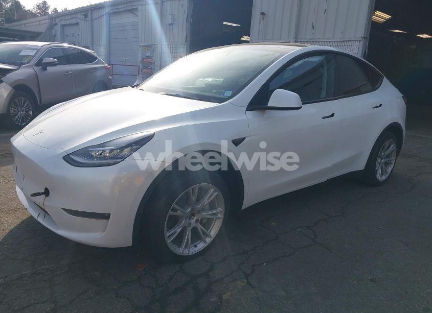 Photo 2 of 2023 Tesla Model Y AWD/LONG RANGE DUAL MOTOR ALL-WHEEL DRIVE (VIN 7SAYGDEE2PA155638)