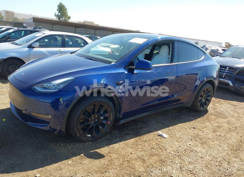 Photo 2 of 2023 Tesla Model Y AWD/LONG RANGE DUAL MOTOR ALL-WHEEL DRIVE (VIN 7SAYGDEE2PF614833)