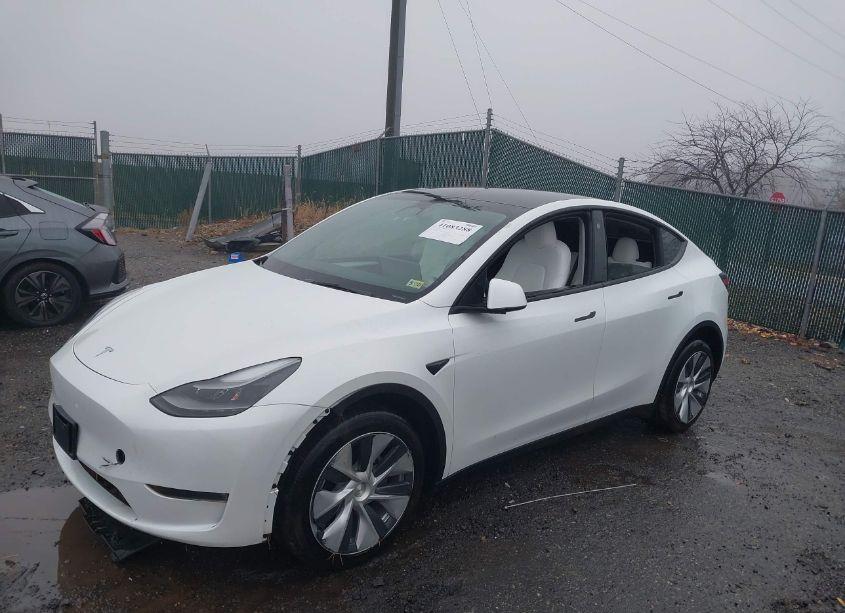 Photo 2 of 2023 Tesla Model Y AWD/LONG RANGE DUAL MOTOR ALL-WHEEL DRIVE (VIN 7SAYGDEE2PF701227)