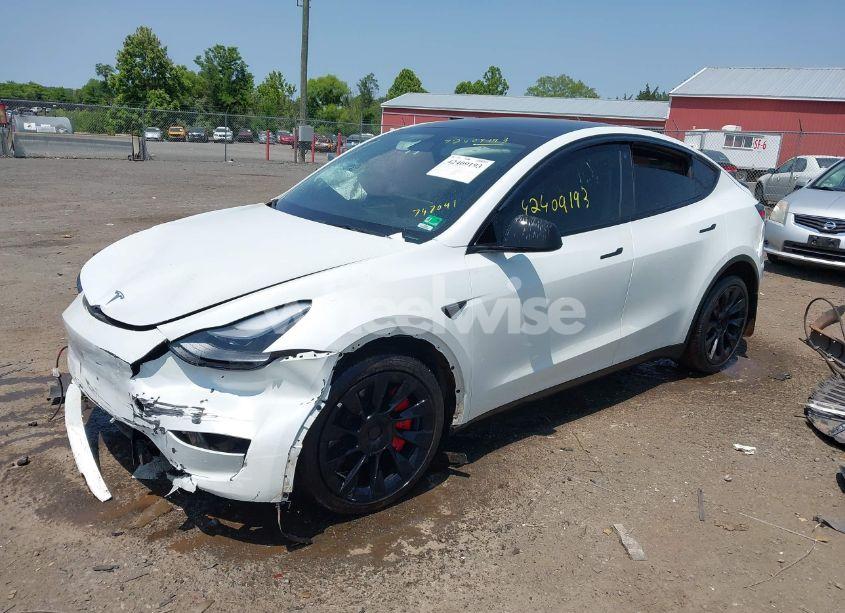 Photo 2 of 2023 Tesla Model Y (VIN 7SAYGDEE2PF747091)