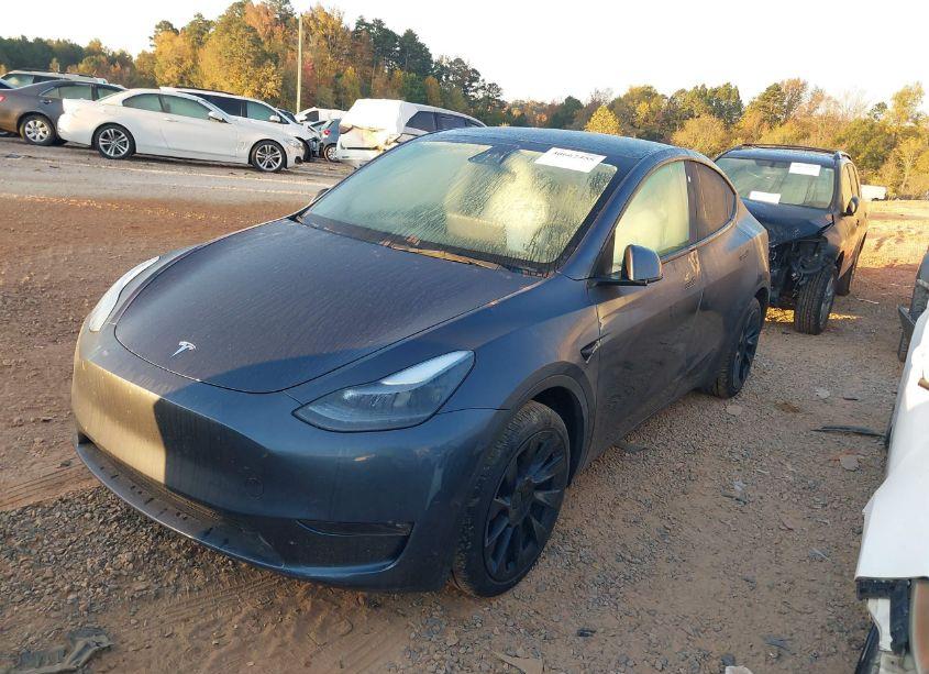Photo 2 of 2023 Tesla Model Y (VIN 7SAYGDEE2PF754624)